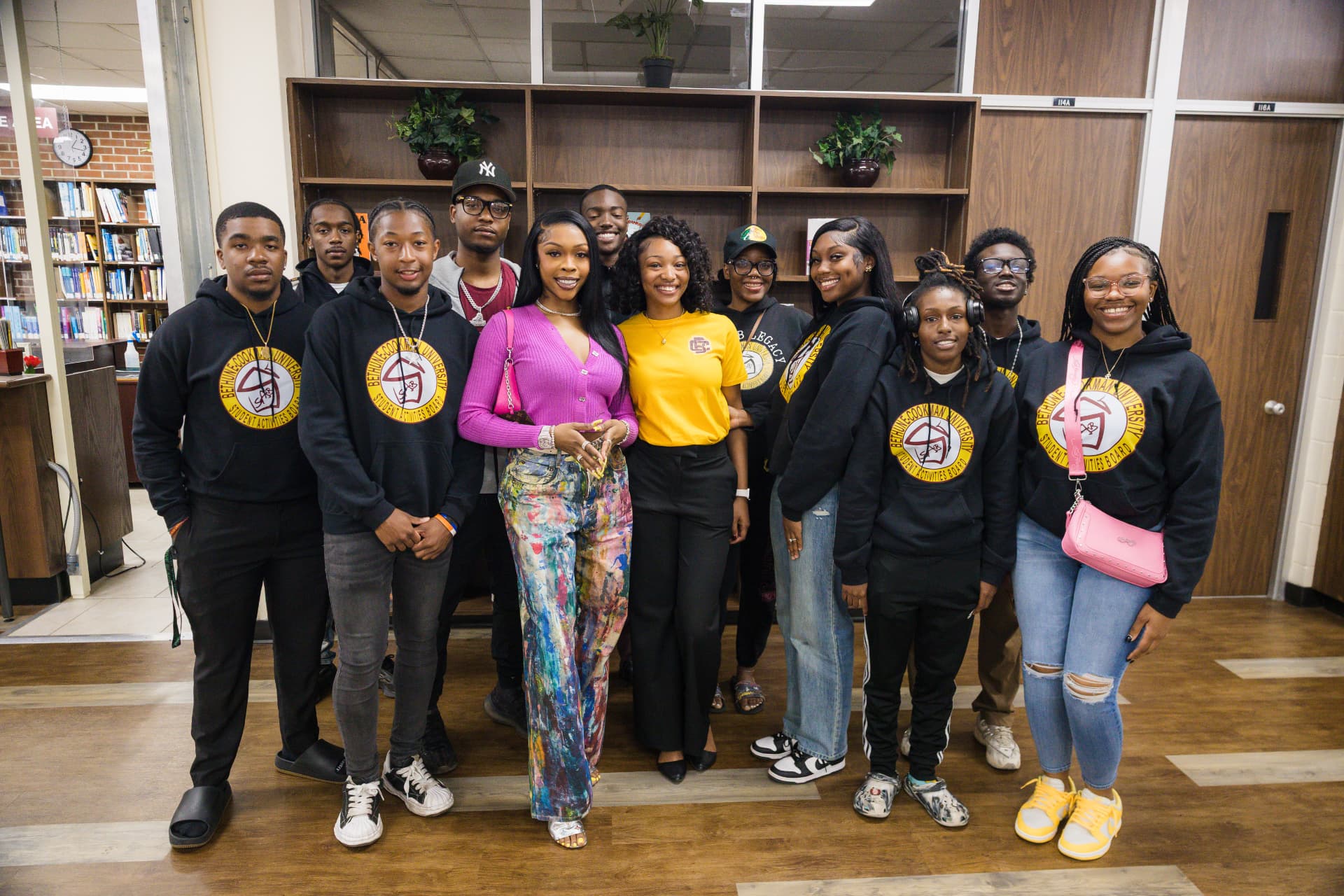 Student activities board members with a visiting recording artist