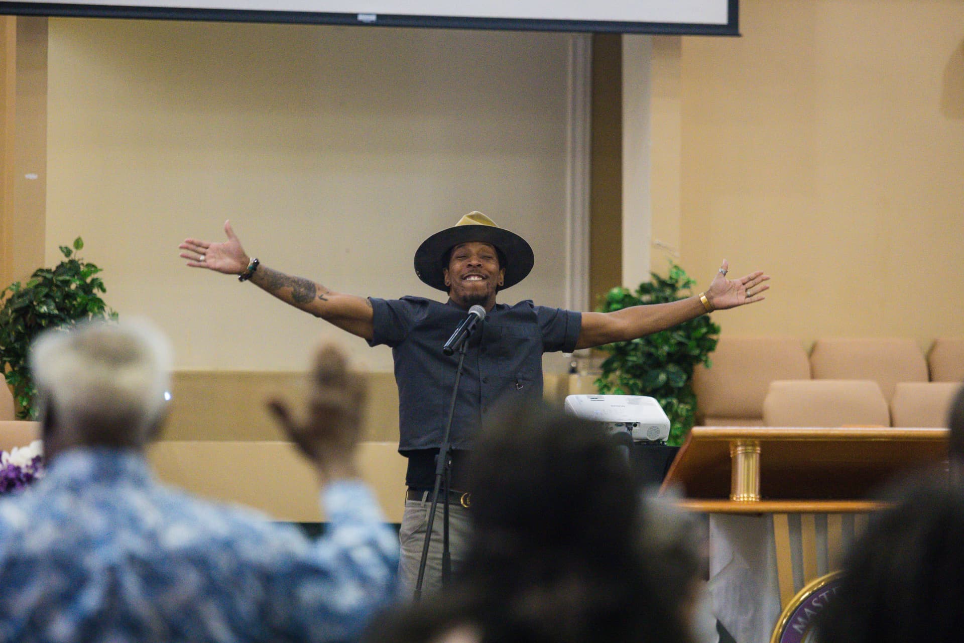 Deitrick Haddon engaging the congregation at a Souls to the Polls service