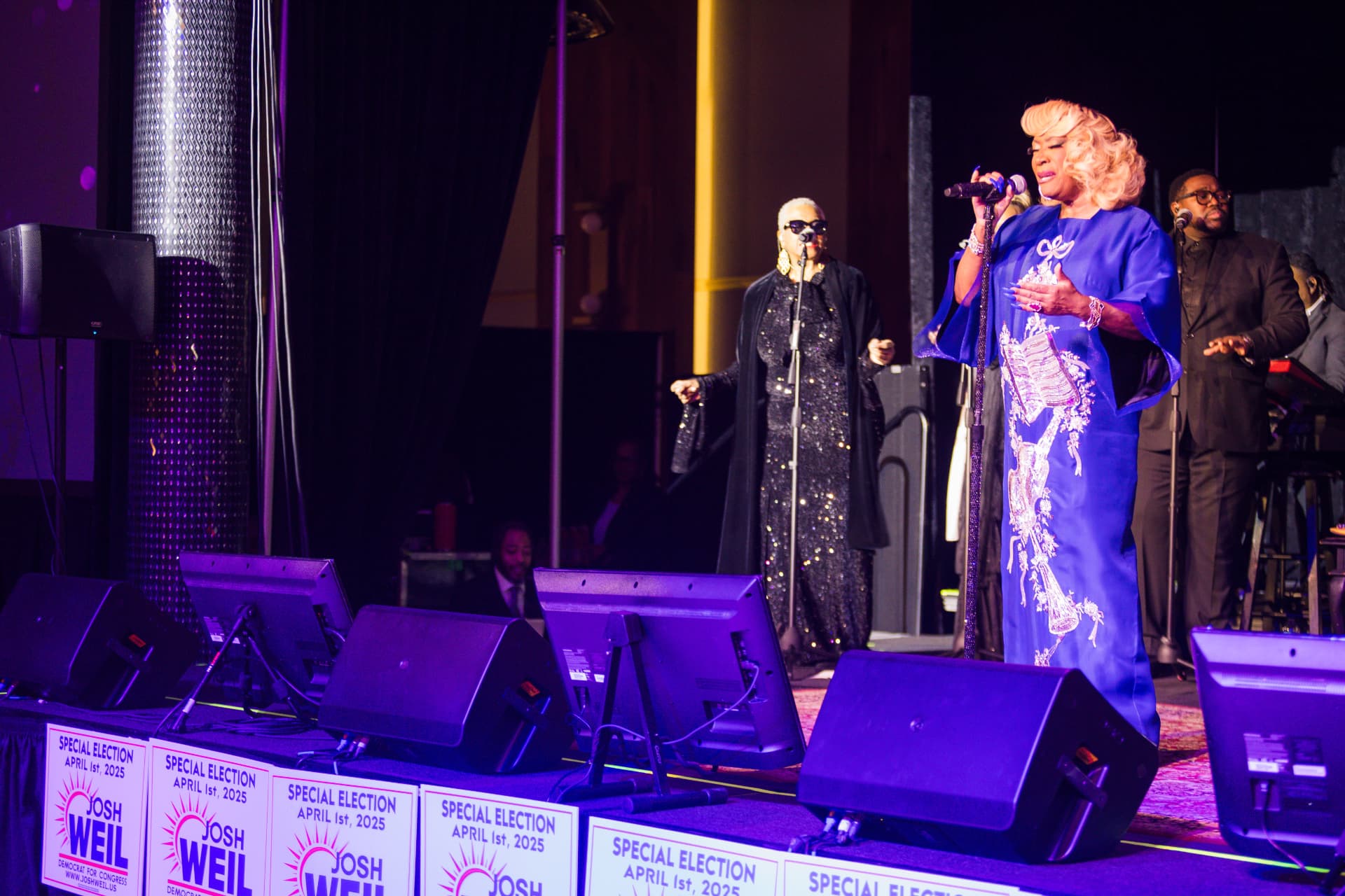 Patti LaBelle performing on stage at a special election event